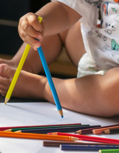 girl-in-white-and-red-hello-kitty-shirt-holding-blue-pencil.jpg girl in white and red hello kitty shirt holding blue pencil